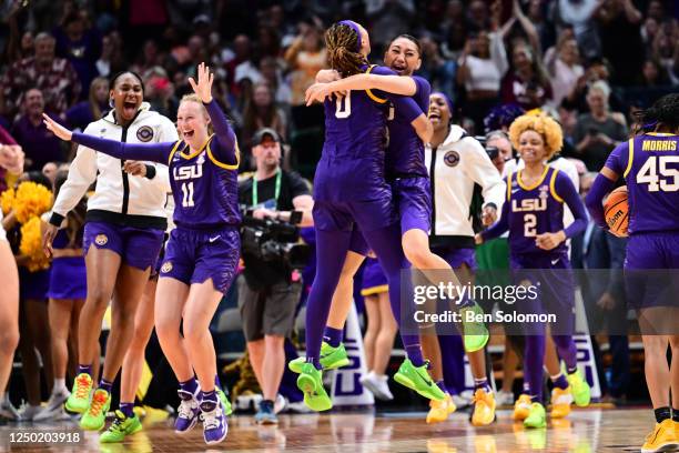 Louisiana State Tigers players celebrate their win over the Virginia Tech Hokies during the semifinals of the NCAA Womens Basketball Tournament Final...