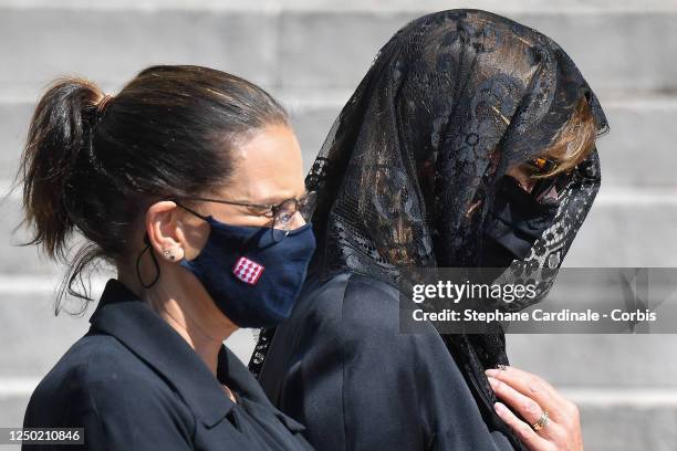 Princess Stephanie of Monaco and Princess Caroline of Hanover arrive at the Monaco Cathedral for Elizabeth-Ann De Massy's Funerals on June 17, 2020...