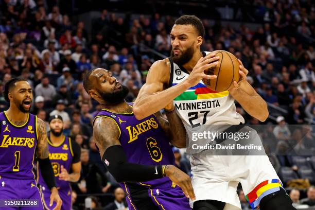 Rudy Gobert of the Minnesota Timberwolves goes to the basket while LeBron James of the Los Angeles Lakers defends in the third quarter of the game at...