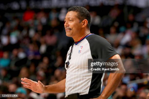 Referee Bill Kennedy smiles during the game between the Chicago Bulls and the Charlotte Hornets on March 31, 2023 at Spectrum Center in Charlotte,...