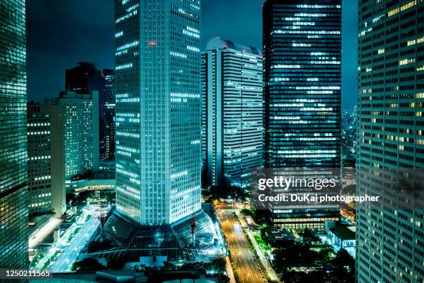 night view of shinjuku cbd in tokyo - tokyo financial district stock pictures, royalty-free photos & images