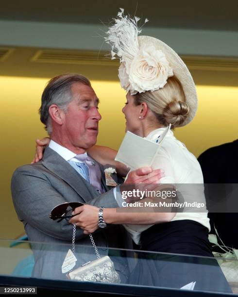 Zara Phillips hugs Prince Charles, Prince of Wales as they attend day 1 of Royal Ascot at Ascot Racecourse on June 17, 2008 in Ascot, England.