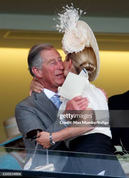 Zara Phillips kisses Prince Charles, Prince of Wales as they attend day 1 of Royal Ascot at Ascot Racecourse on June 17, 2008 in Ascot, England.