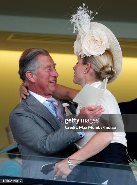 Zara Phillips hugs Prince Charles, Prince of Wales as they attend day 1 of Royal Ascot at Ascot Racecourse on June 17, 2008 in Ascot, England.