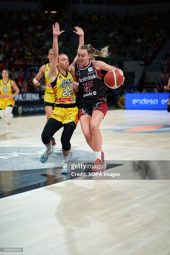 Faustine Parra of Spar Girona (L) and Gabija Meskonyto of...