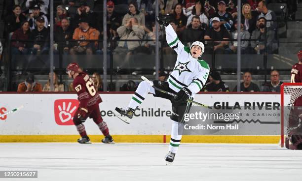 Jason Robertson of the Dallas Stars celebrates after scoring a goal against the Arizona Coyotes during the second period at Mullett Arena on March...