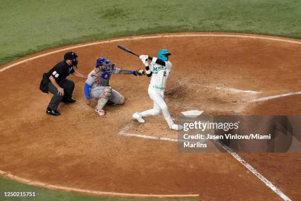 Jazz Chisholm Jr. #2 of the Miami Marlins connects for a solo homerun in the 8th inning against the New York Mets at loanDepot park on March 31, 2023...