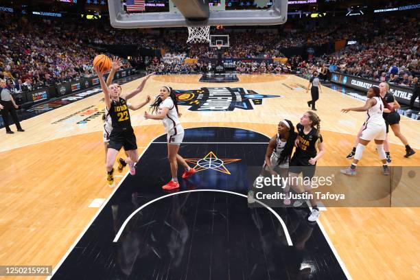 Caitlin Clark of the Iowa Hawkeyes lays up the ball against the South Carolina Gamecocks during the semifinals of the NCAA Women's Basketball...