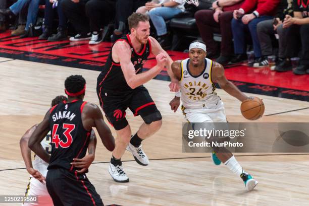 March 22, 2023: Buddy Hield of the Indiana Pacers tries to move with the ball during the Toronto Raptors v Indiana Pacers NBA regular season game at...