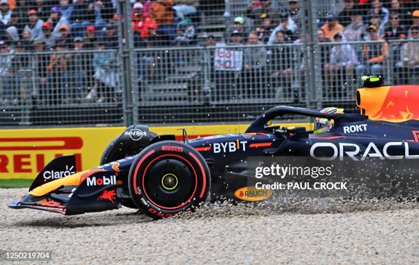 Red Bull Racing's Mexican driver Sergio Perez drives off the track during the qualifying round of the 2023 Formula One Australian Grand Prix at the...