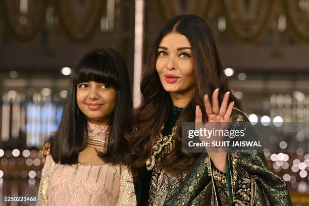 In this picture taken on March 31 Bollywood actress Aishwarya Rai Bachchan and her daughter Aaradhya Bachchan pose for pictures during the...
