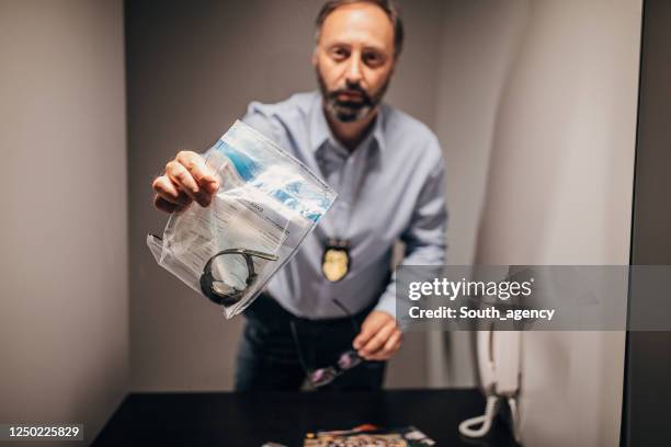 Evidence Box Interrogation 368 Police Interrogation Room Stock Photos, High-Res Pictures, and ...