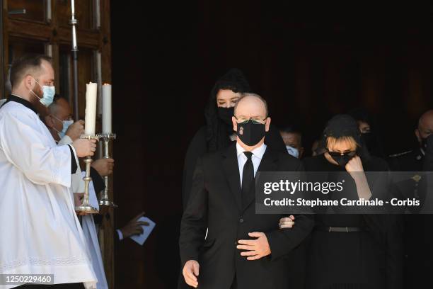 Melanie Antoinette de Massy, Prince Albert II of Monaco and Princess Charlene of Monaco leave the Monaco Cathedral after Elizabeth-Ann De Massy's...