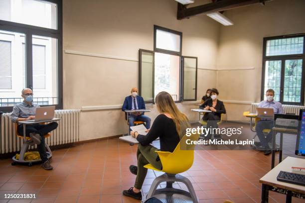The examination committee with professors in accordance with the standard for social distancing on June 17, 2020 in Bologna, Italy. High School...