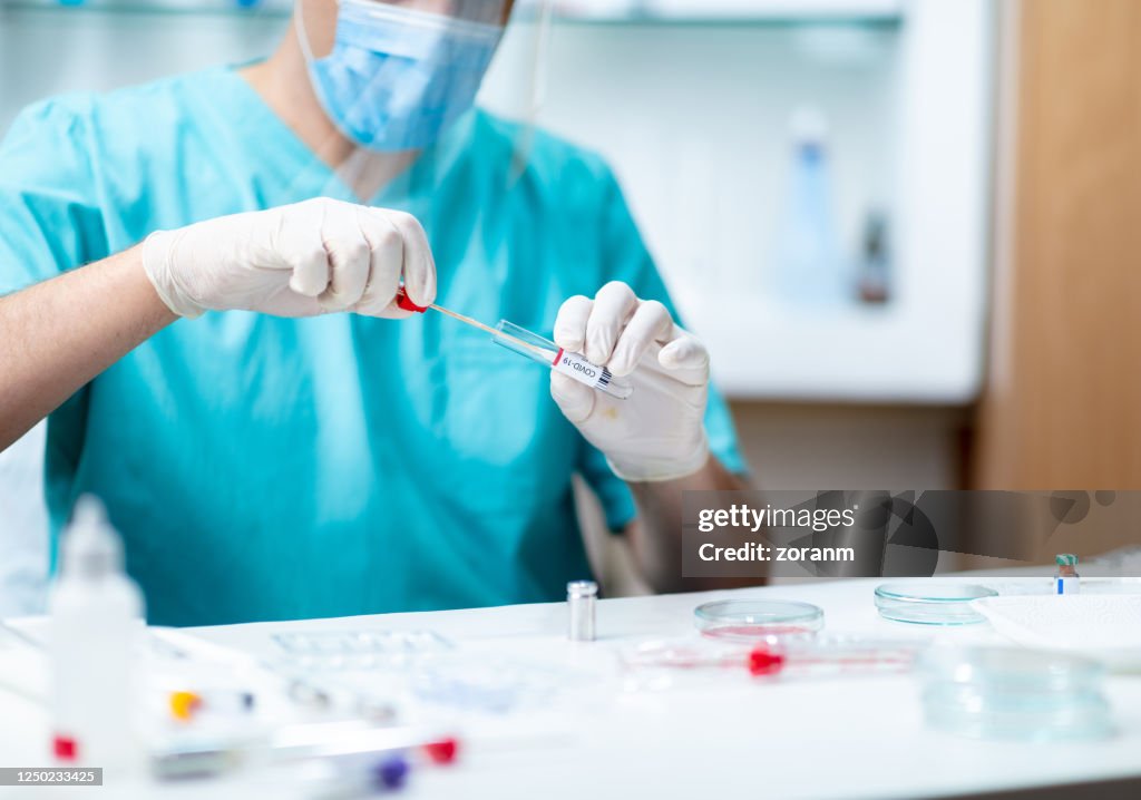 Lab Instrument Rep Covid Testing Lab Technician Taking Saliva From Covid19 Test Kit For Analysis High ...