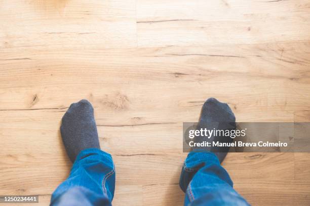 low section of a man in socks - quarantaine stockfoto's en -beelden