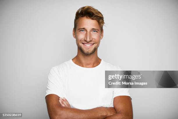 portrait of handsome young man on white background - white t shirt bildbanksfoton och bilder