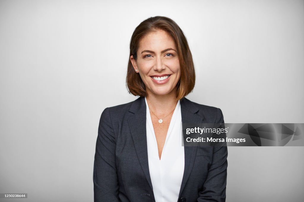 Portrait Of Businesswoman Against White Background