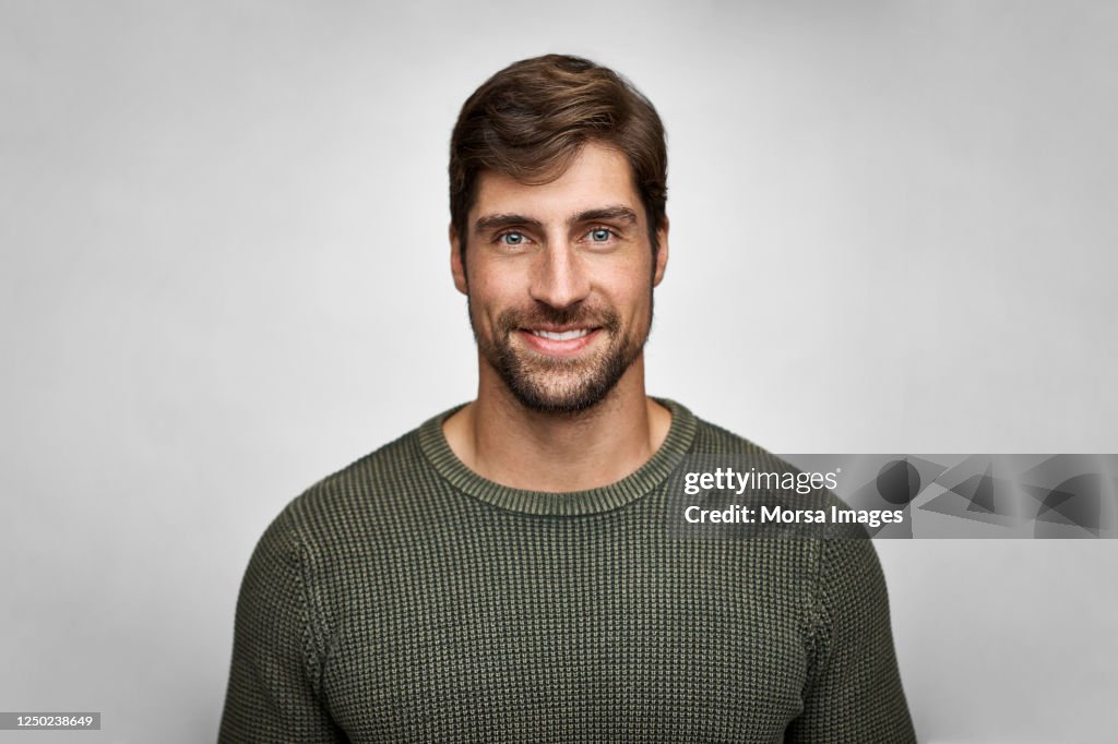 Portrait Of Handsome Smiling Man In Casuals