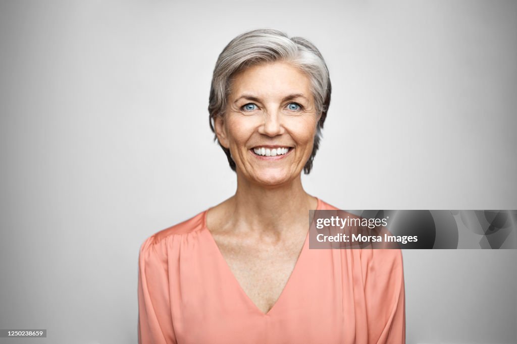 Portrait Of Smiling Senior Executive.