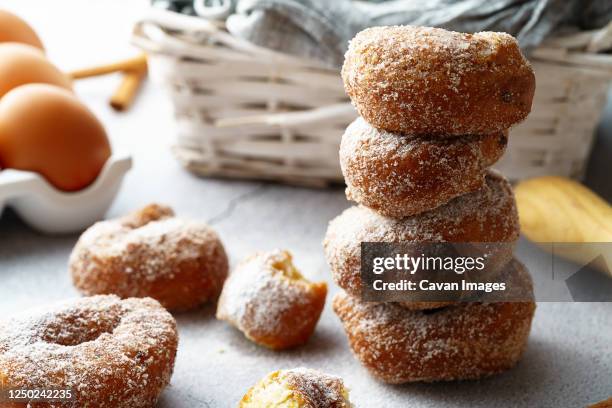 small doughnut of wine with sugar and cinnamon and ingredients. donuts dessert - dónute imagens e fotografias de stock