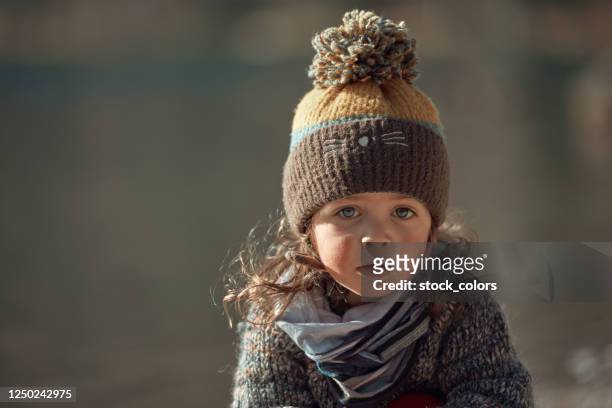 beautiful baby girl with rosy cheeks - romania stock pictures, royalty-free photos & images
