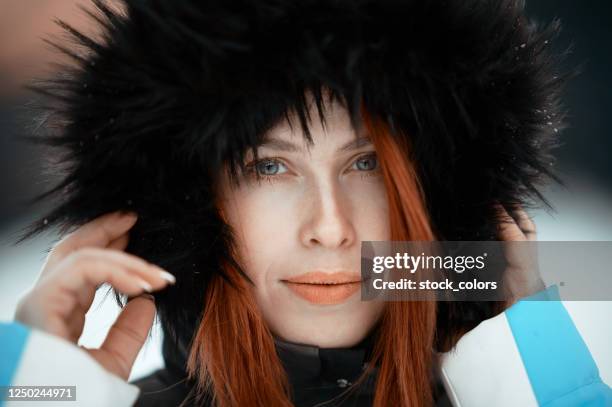 romanian redhead with beautiful blue eyes - one mid adult woman only stock pictures, royalty-free photos & images