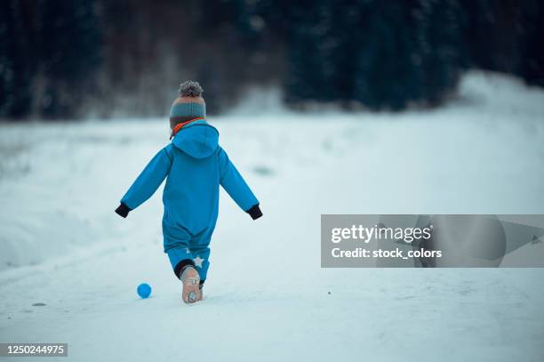 it's fun to play outdoors during winter - blue shoe stock pictures, royalty-free photos & images