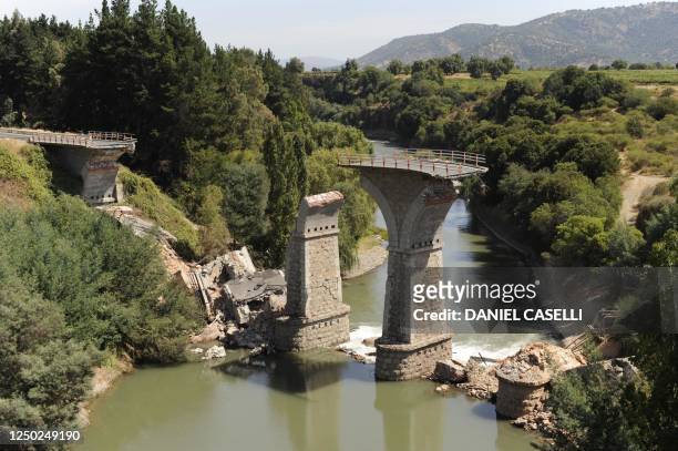 View of a collapsed bridge on the expressway A-5, some 150 km south of Santiago, on March 4, 2010. Chile said Thursday it was reviewing the official...