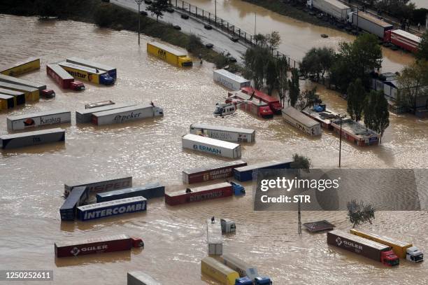 An aerial view shows flood-damaged vehicles on September 9, 2009 in Istanbul. At least 14 people were killed as heavy overnight rains flooded parts...