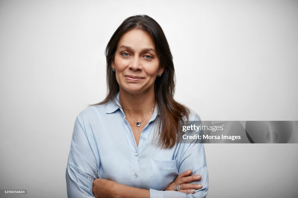 Female White Collar Worker With Arms Crossed