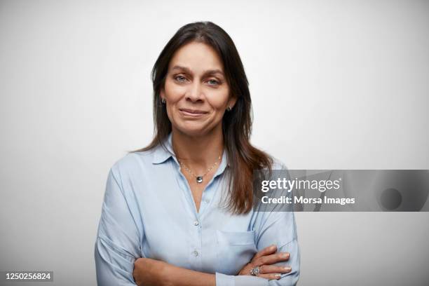 female white collar worker with arms crossed - white blouse bildbanksfoton och bilder