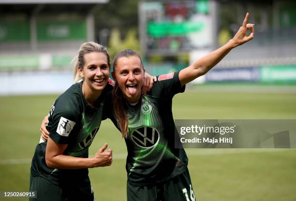 Lena Goeßling of Wolfsburg celebrate with team mate Noelle Maritz after the Flyeralarm Frauen Bundesliga match between VfL Wolfsburg Women's and SC...