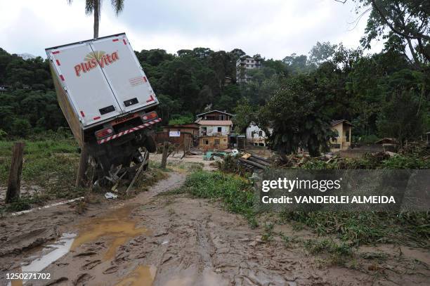 Delivery truck is seen stuck among wreckage caused by landslides and flooding in Teresopolis, some 100 km from downtown Rio de Janeiro, Brazil on...