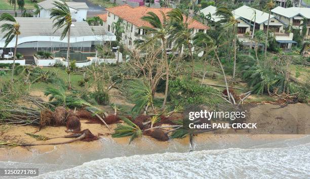 This aerial view shows damaged vegetation after Cyclone Yasi hit the Queensland coastal area of Mission Beach on February 3, 2011. Australia's...