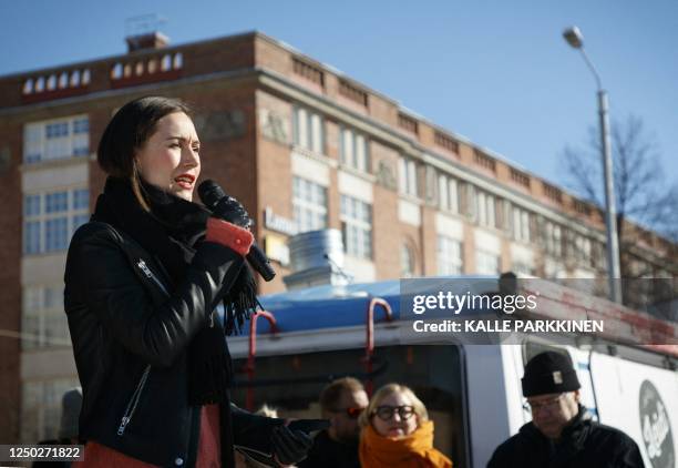 Chair of the Social Democratic Party SDP and Finnish Prime Minister Sanna Marin speaks to supporters during her election campaign at the Tammela...