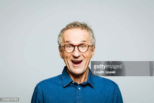 portrait of excited senior man - surprised portrait stock pictures, royalty-free photos & images