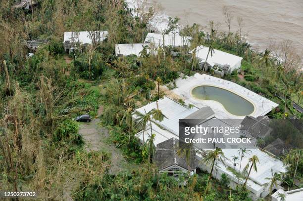 An aerial photo taken on February 3, 2011 shows the aftermath of Cyclone Yasi at Mission Beach on February 3, 2011. Smashed yachts lay stacked like...