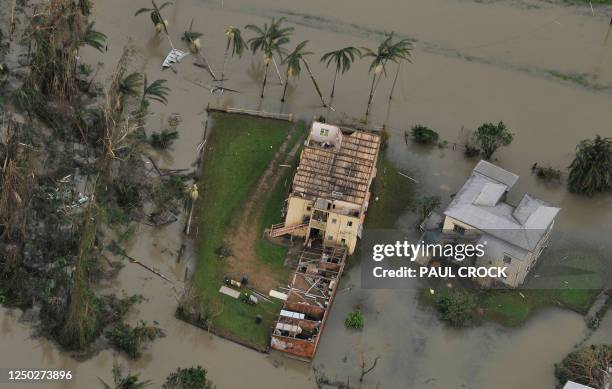 This aerial view shows buildings damaged after Cyclone Yasi hit the Queensland town of Tully on February 3, 2011. Australia's biggest cyclone in a...