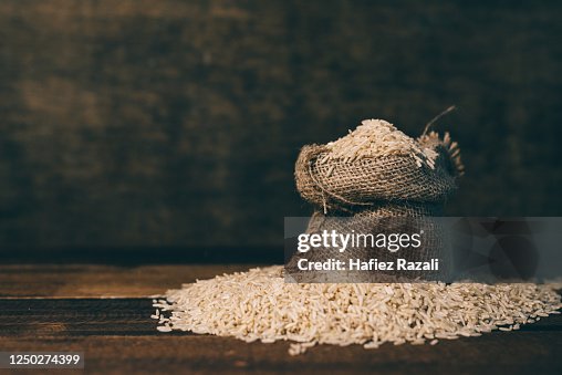 Dusty Ration Raw Rice Natural Raw Unpolished Brown Rice In Burlap Sack On Wooden Table High ...