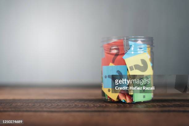 question mark in a jar - q and a stock pictures, royalty-free photos & images