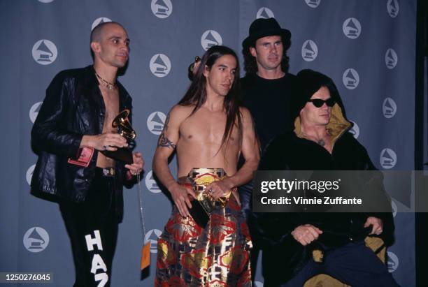 American musicians Arik Marshall, Anthony Kiedis, Chad Smith and Flea of rock band Red Hot Chili Peppers celebrate their win as "Best Hard Rock...