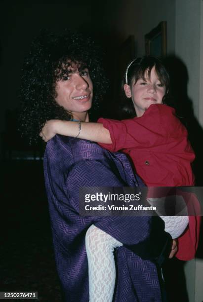 American child actor Meeno Peluce with his sister, American child actress Soleil Moon Frye, attend the 37th Annual Primetime Emmy Awards, held at the...