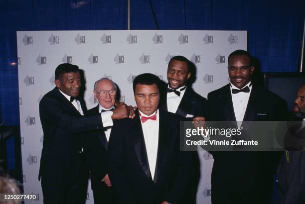 American professional boxer Floyd Patterson , Irish-Canadian professional boxer Jimmy McLarnin , American professional boxer, activist, and...