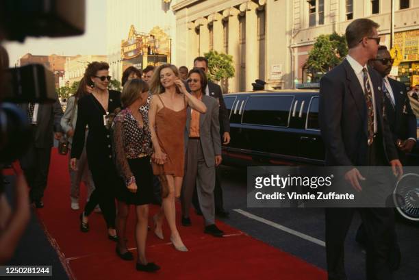 Actress Michelle Pfeiffer, niece Nicki, and actor Fisher Stevens attend the "Batman Returns" Hollywood Premiere at Mann's Chinese Theatre in...