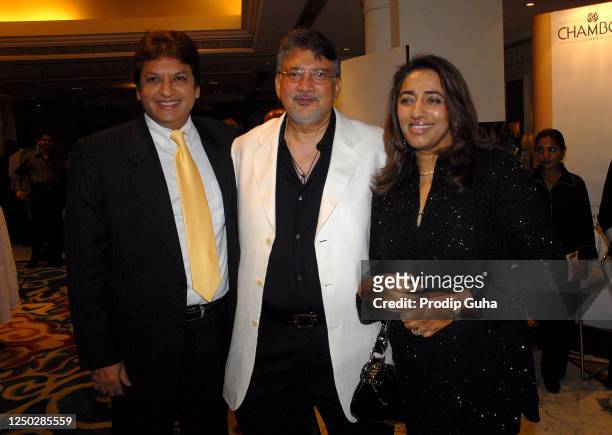Shashi Ranjan, guest and Anu Ranjan attend a fashion show in aid of “Beti Bachao Against Female Foeticide” on August 09, 2008 in Mumbai, India.