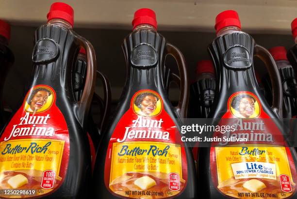 Bottles of Aunt Jemima pancake syrup are displayed on a shelf at a Safeway store on June 17, 2020 in San Anselmo, California. Quaker Oats announced...