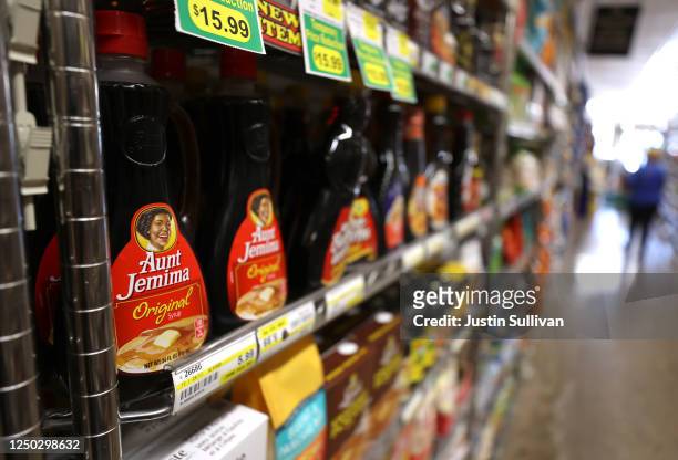 Bottles of Aunt Jemima pancake syrup are displayed on a shelf at Scotty's Market on June 17, 2020 in San Rafael, California. Quaker Oats announced...