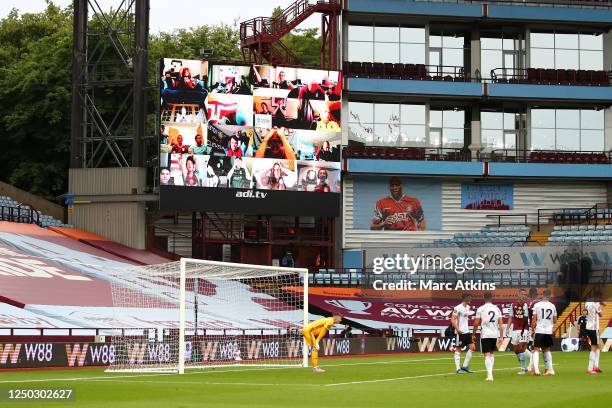 General view inside the stadium as Aston Villa fans watching at home are displayed on the Big Screen, as they react to a missed chance from Aston...