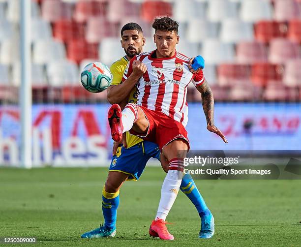 Darwin Nunez of UD Almeria competes for the ball with Alex Suarez of Las Palmas during the La Liga Smartbank match between UD Almeria and UD Las...